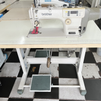 MÁY MAY ĐIỆN TỬ NHÂT CŨ  BROTHER  S-7000DD-303A