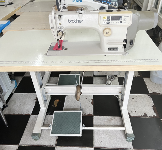 MÁY MAY ĐIỆN TỬ NHÂT CŨ  BROTHER  S-7000DD-303A