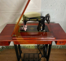 Máy gia đình Singer bàn bụng chân đạp truyền thống (bàn gỗ cây)